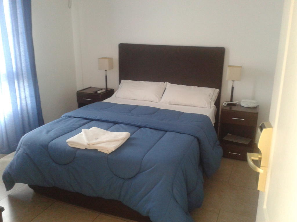 Morada Suites Campana Cameră foto