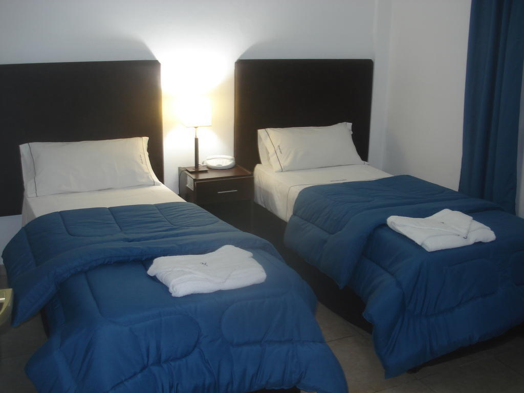 Morada Suites Campana Cameră foto