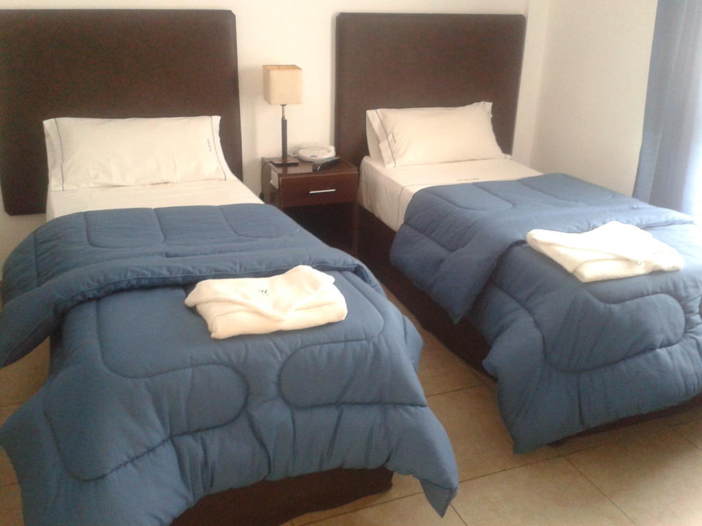 Morada Suites Campana Cameră foto