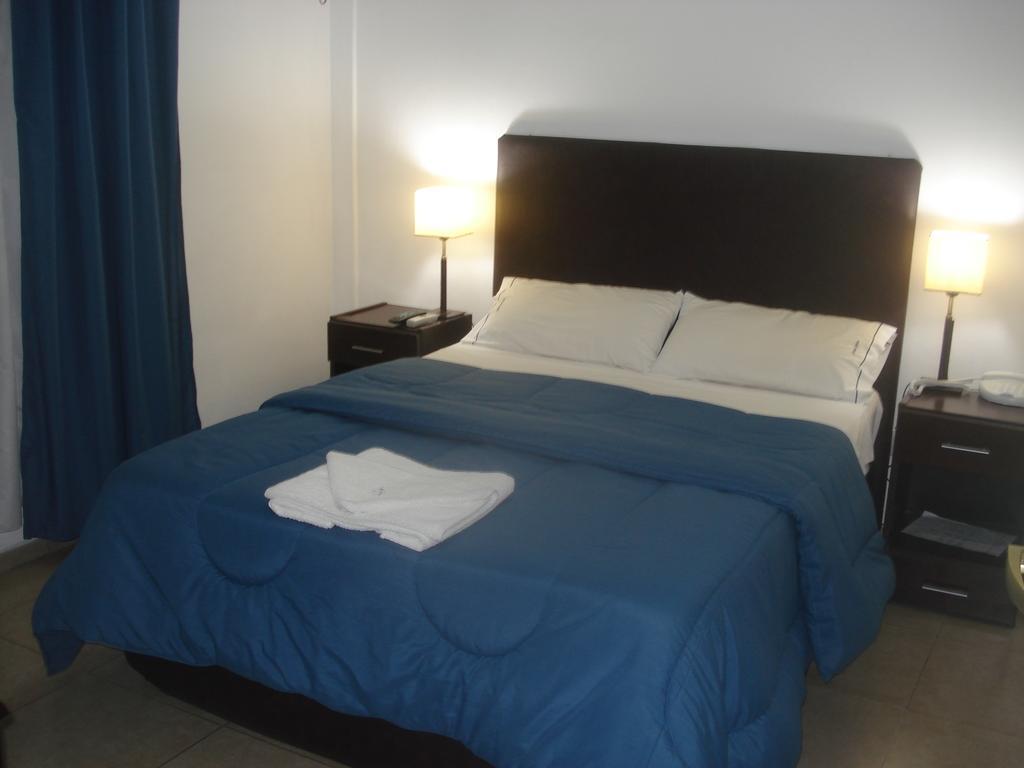 Morada Suites Campana Cameră foto